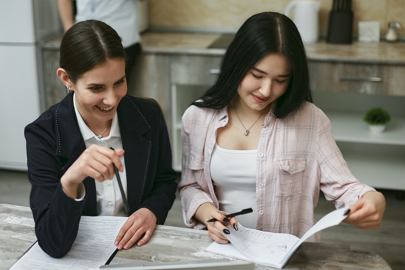 employees looking at notes