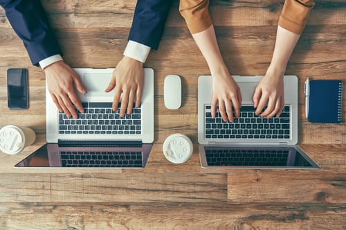 Employees working together to boost employer reputation